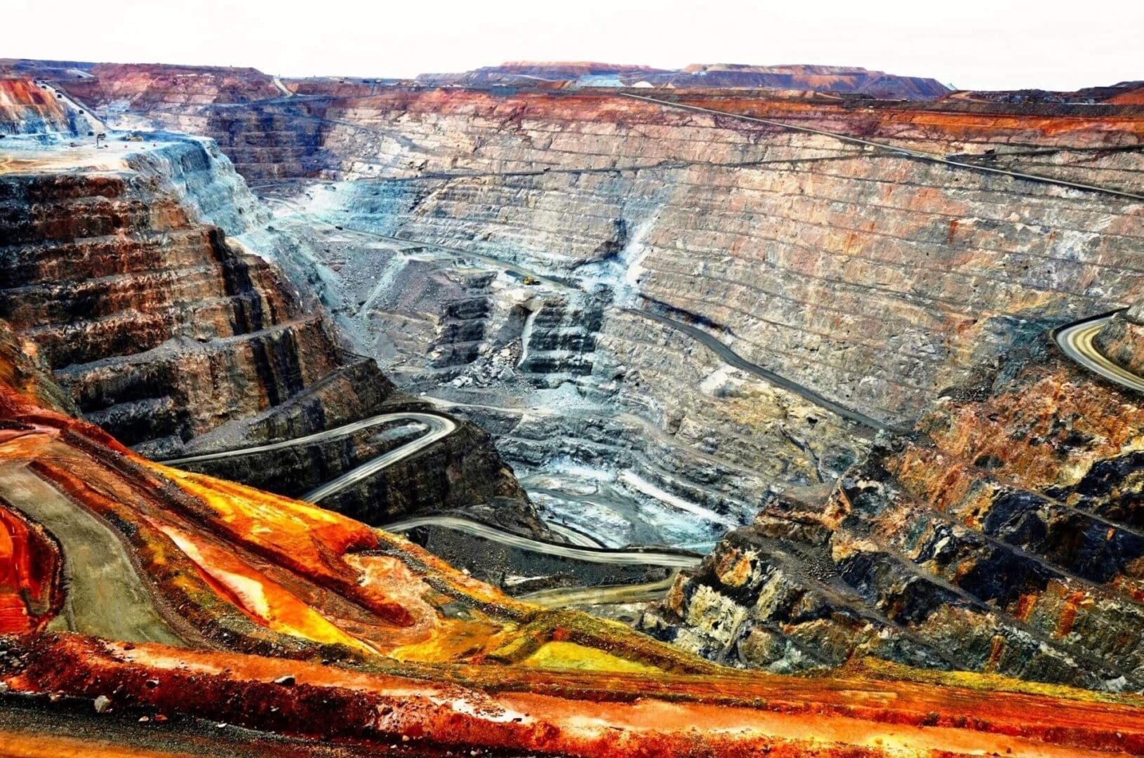 A picture of an open pit with the earth in it.