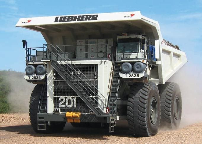 A large truck with two tires on it's wheels.